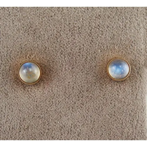 A pair of moonstone stud earrings in 9ct yellow gold mounts,...