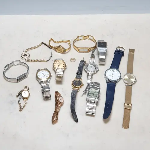 A collection of vintage and modern quartz Wristwatches inclu...