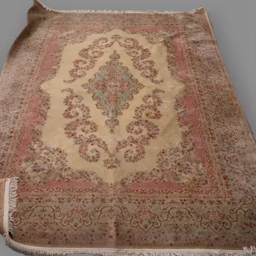 An American cream-ground Karastan Kirman carpet by John Cros...