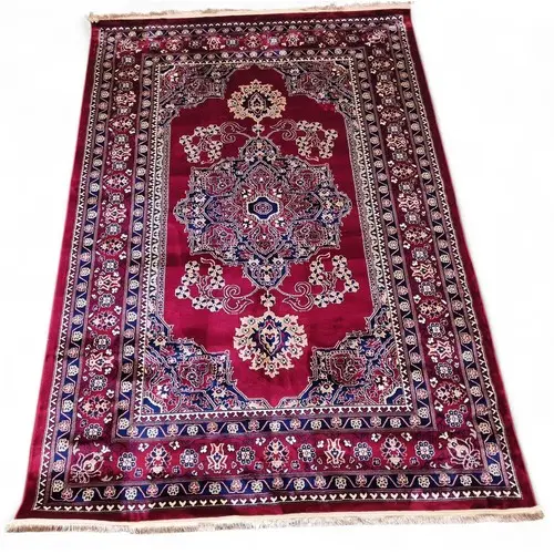 A red ground Turkish Soft Full Pile Carpet with central meda...