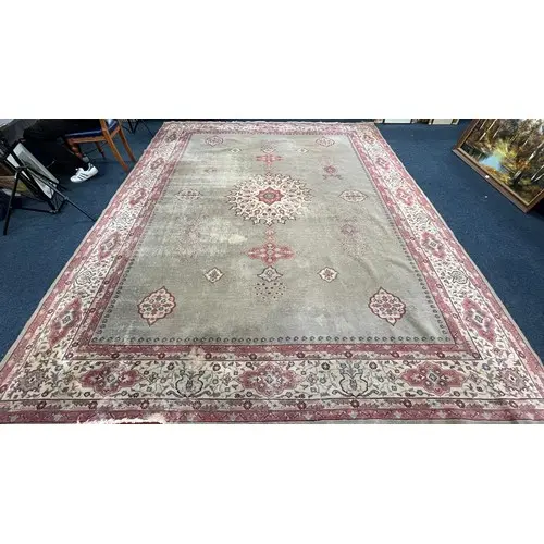 Pink and grey ground carpet with multi border and large cent...