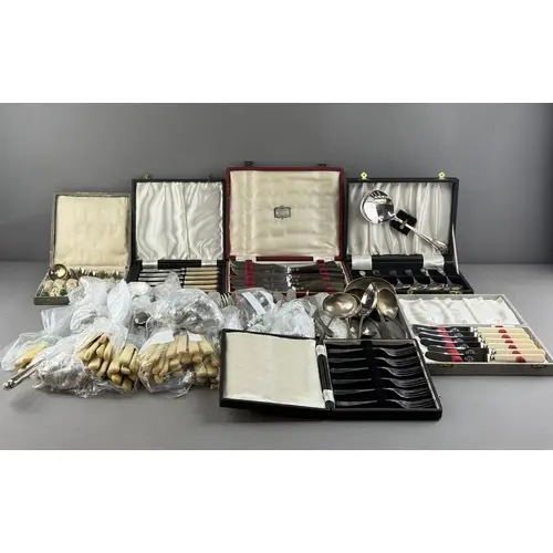 Silver Plate: a boxed set of antler handled knives retailed ...