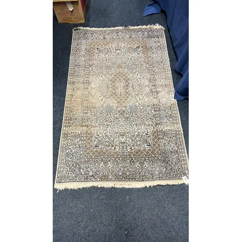 Eastern pale blue ground silk and wool rug, the field decora...