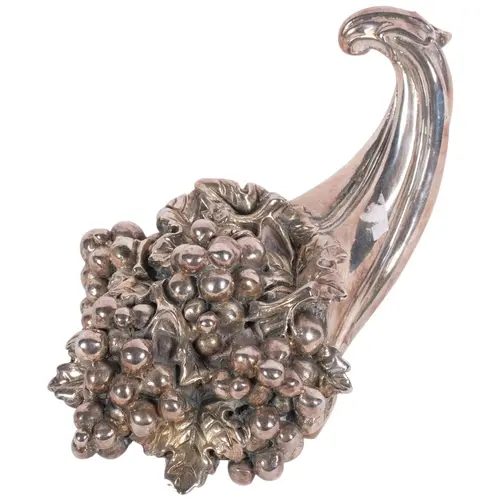A Victorian style 800 silver-clad Rococo grapevine paperweig...