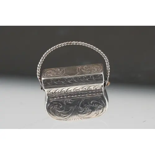 Victorian silver foliate engraved vinaigrette in the form of...