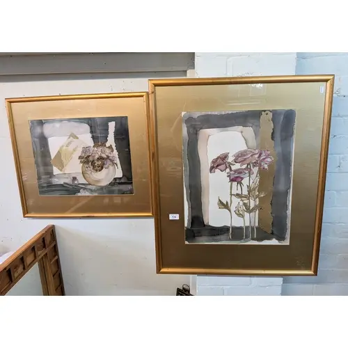 A pair of modern gilt framed art prints of flowers in gilt f...