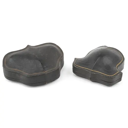 Two antique fitted boxes lined with silk and velvet comprisi...