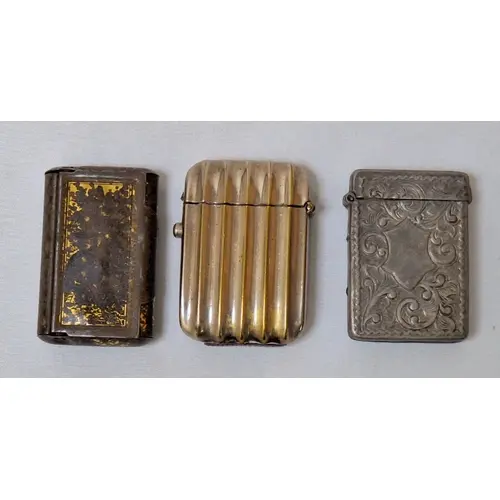 3 Vesta Cases, pewter, ribbed chrome etc. (3)