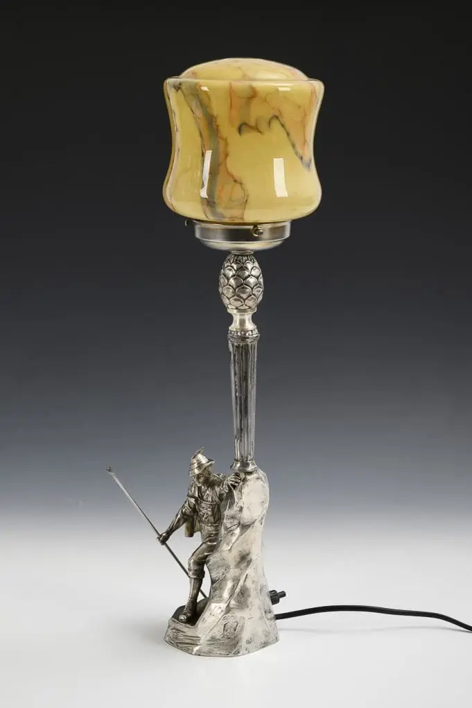 Figurative table lamp with glass shade. WMF.