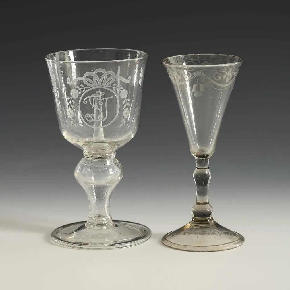 Broken joke glass and goblet.