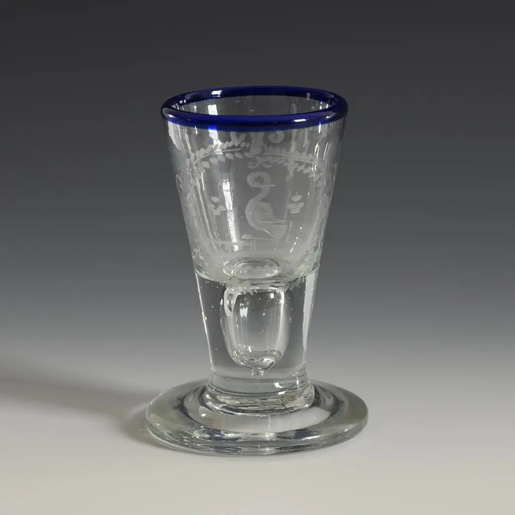 Baroque shot glass with a blue rim. Lauenstein.