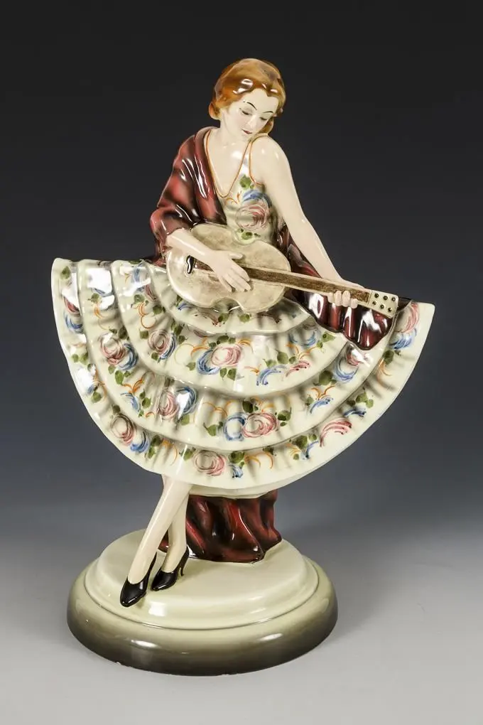 Standing Dancer with Guitar. Vienna-based manufacturer Friedrich Goldscheider.