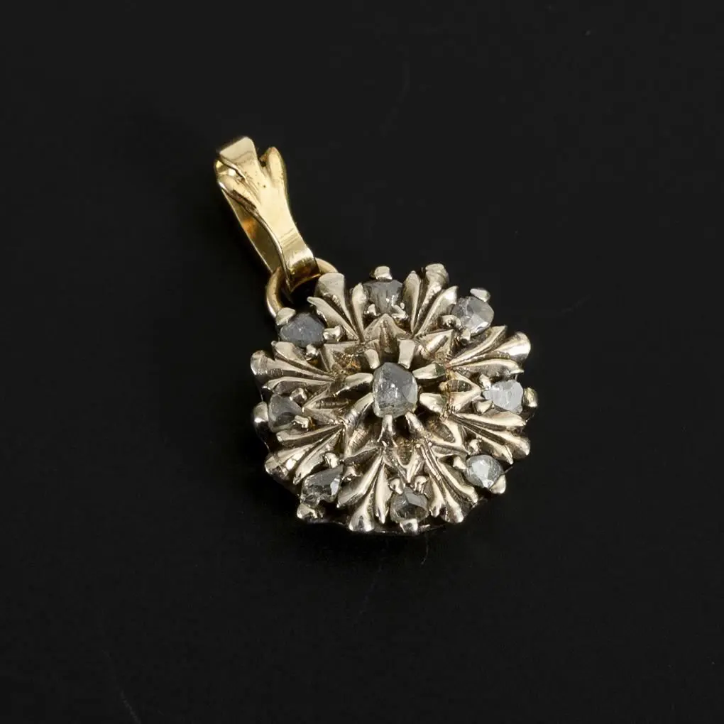 Pendant featuring a historic floral motif.