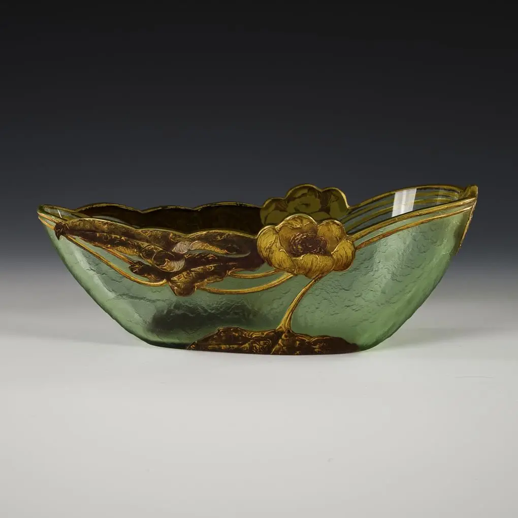 Art Nouveau jardinière with water lily decoration.