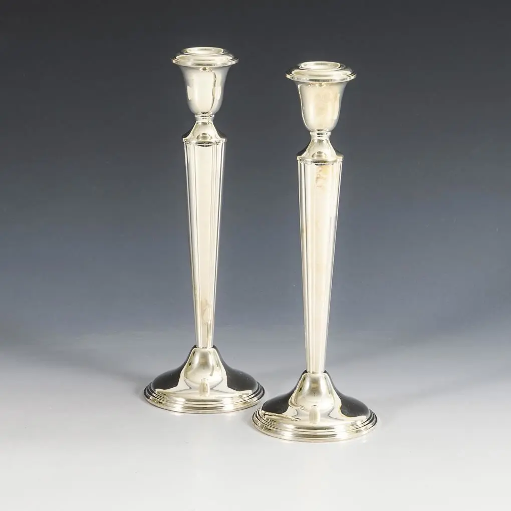 Elegant pair of candlesticks. Empire Sterling.