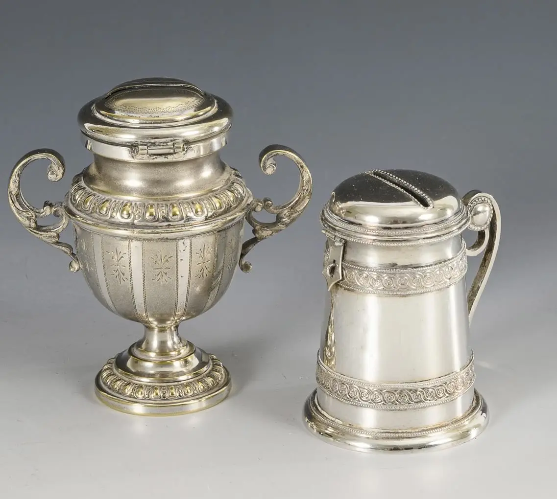 2 antique money boxes.