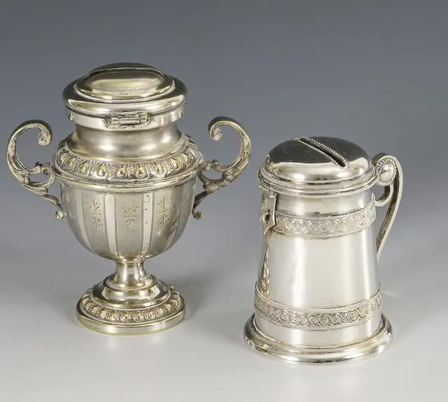 2 antique money boxes.