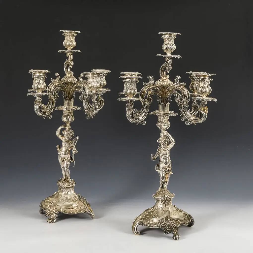 A pair of ornate silver candlesticks. Bruckmann & Söhne, Heilbronn.