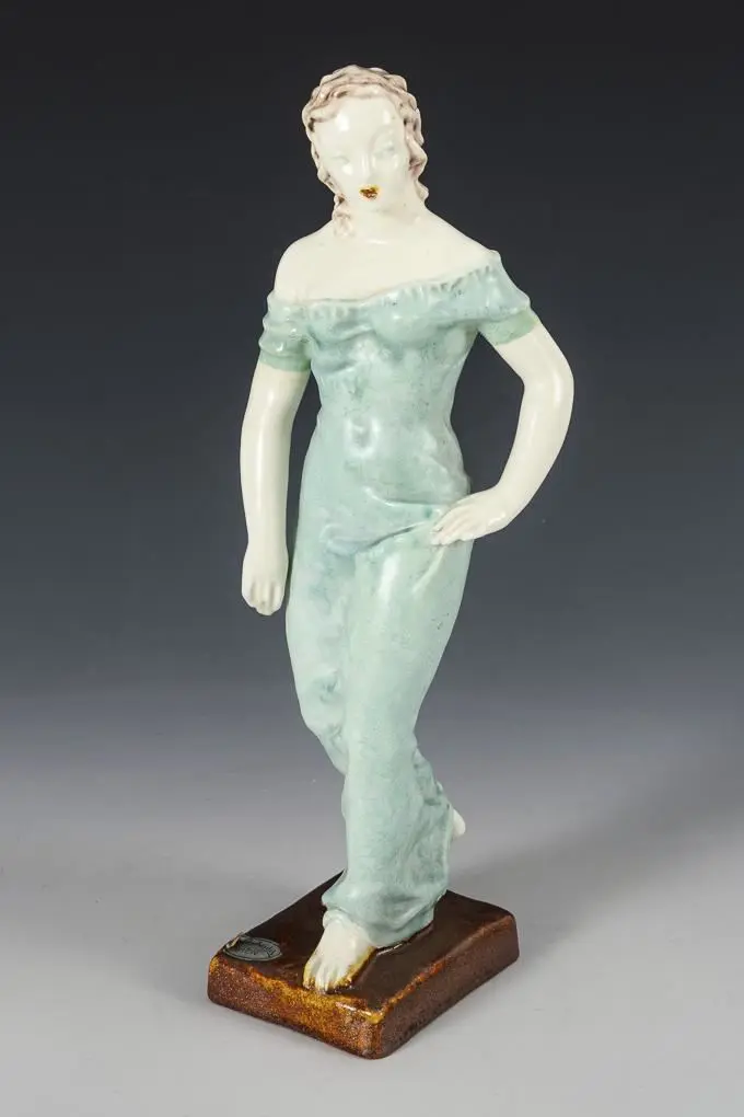 Woman in a light green dress. Vienna-based manufacturer Friedrich Goldscheider.