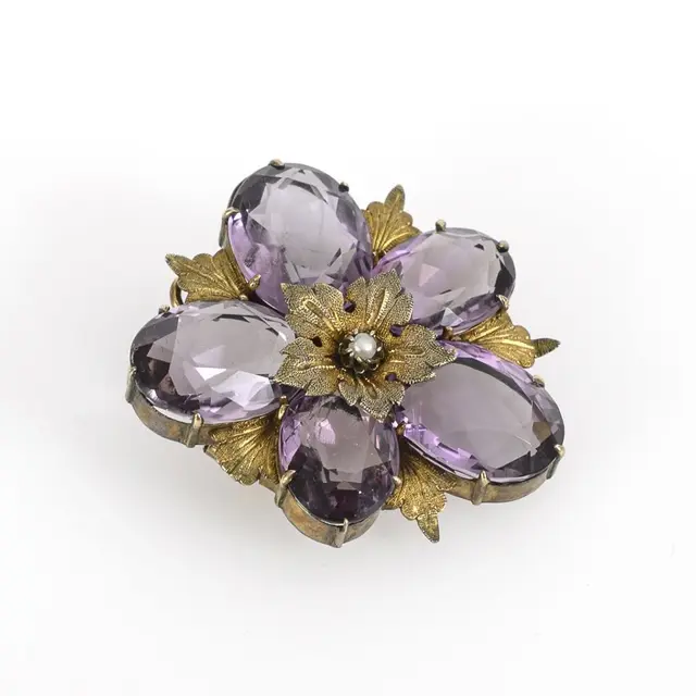 Antique brooch in the shape of a violet.
