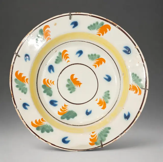 MANISES CERAMICS - Plate with polychrome plant decoration