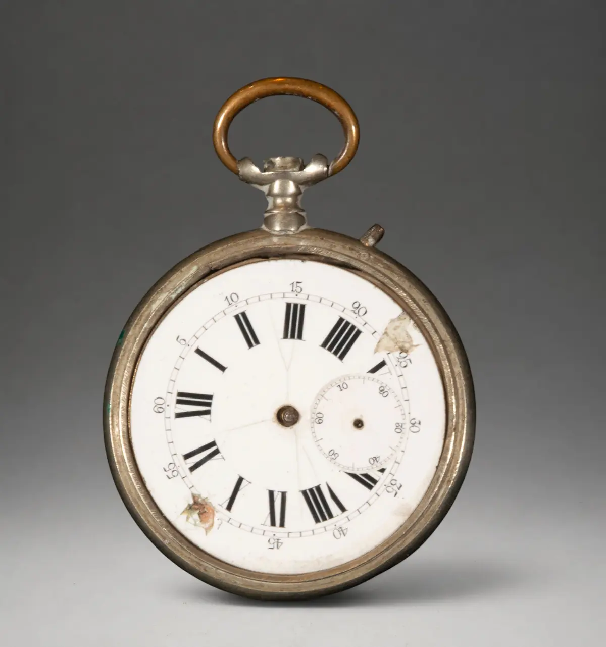 Gold pocket watch with white dial