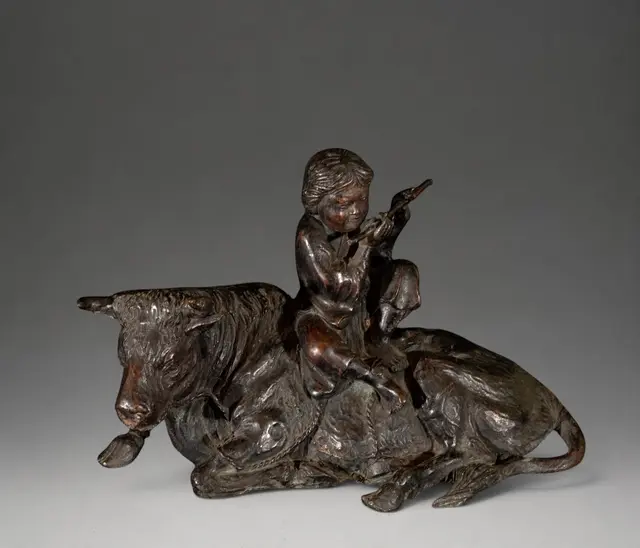 Young shepherd playing the flute next to two cows – French School