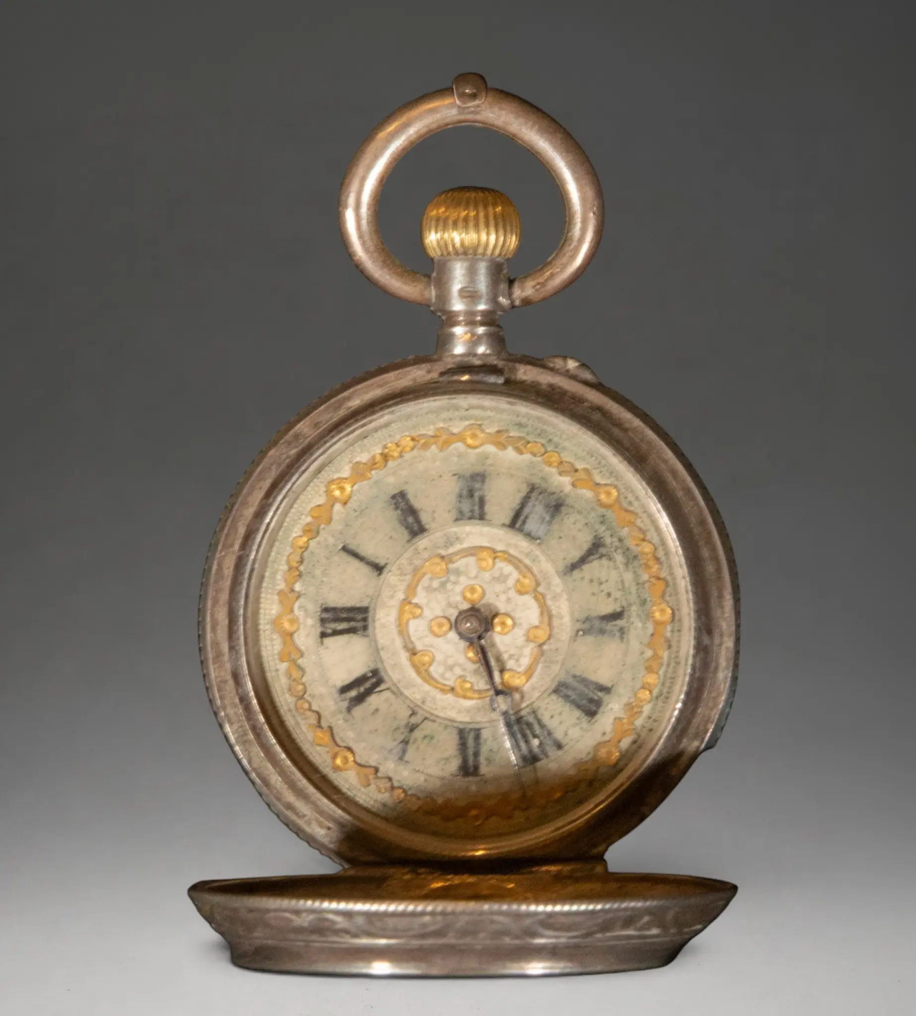 Pocket watch with ornate dial