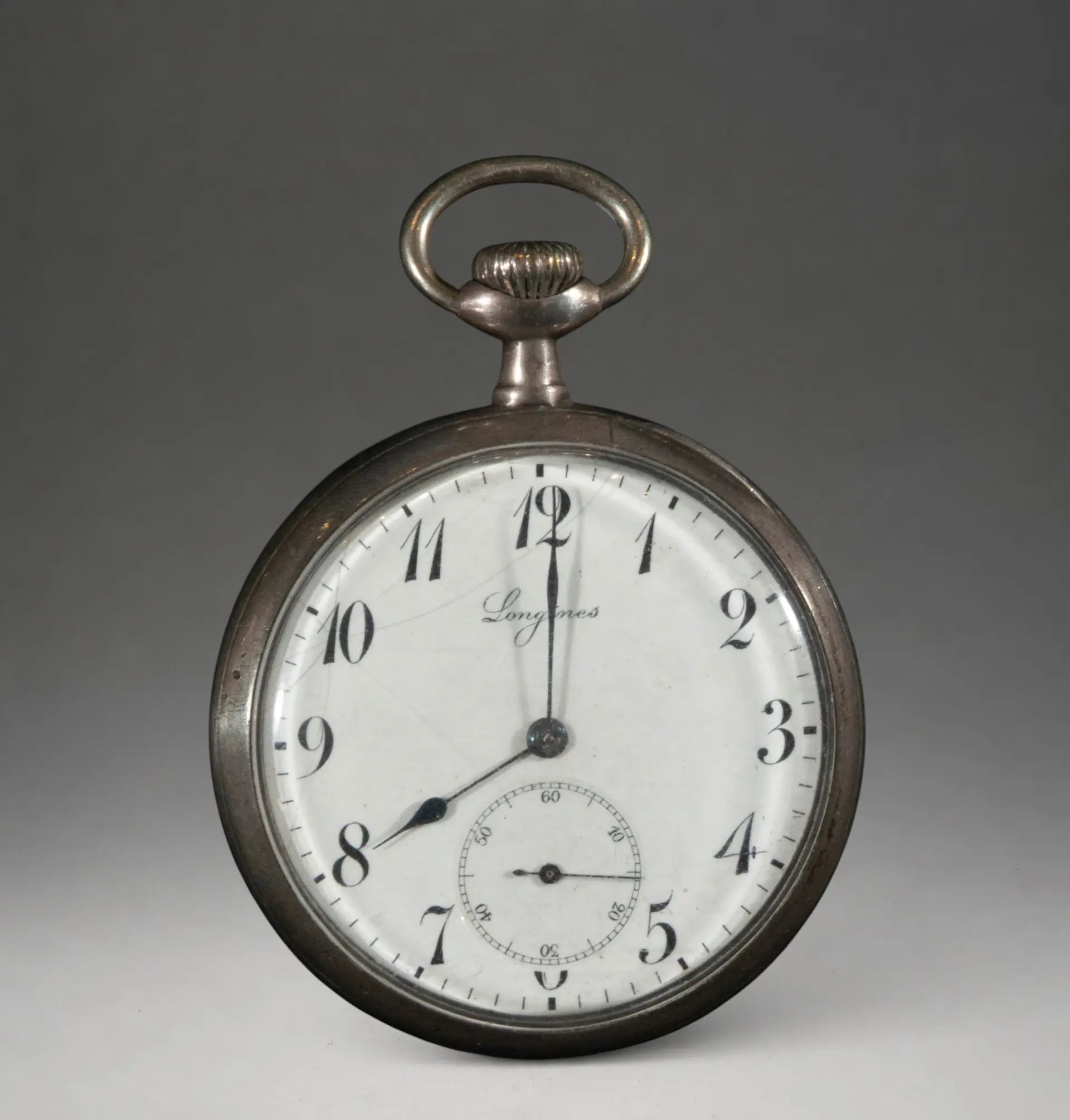 Pocket watch with Arabic numerals and second hand