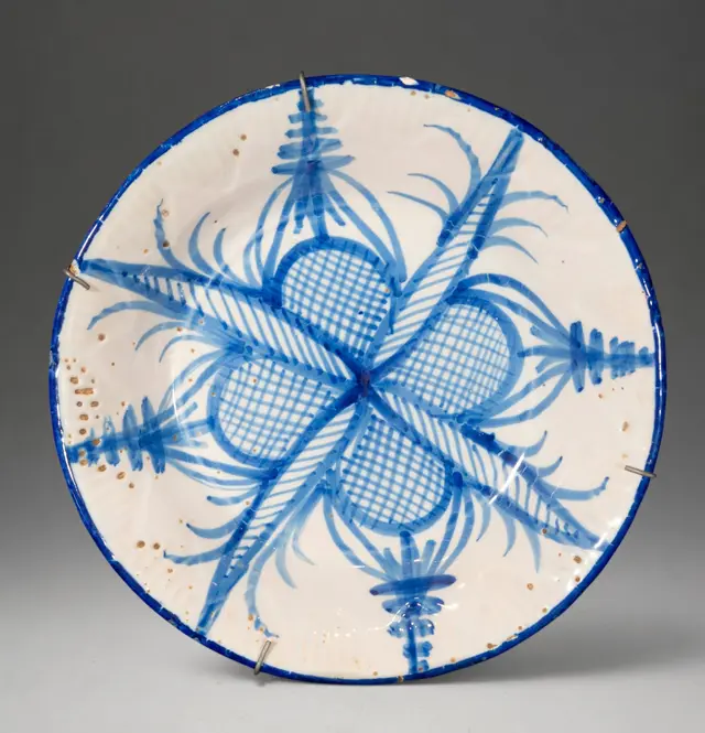 MANISES CERAMICS - Plate with geometric and plant decoration in cobalt blue