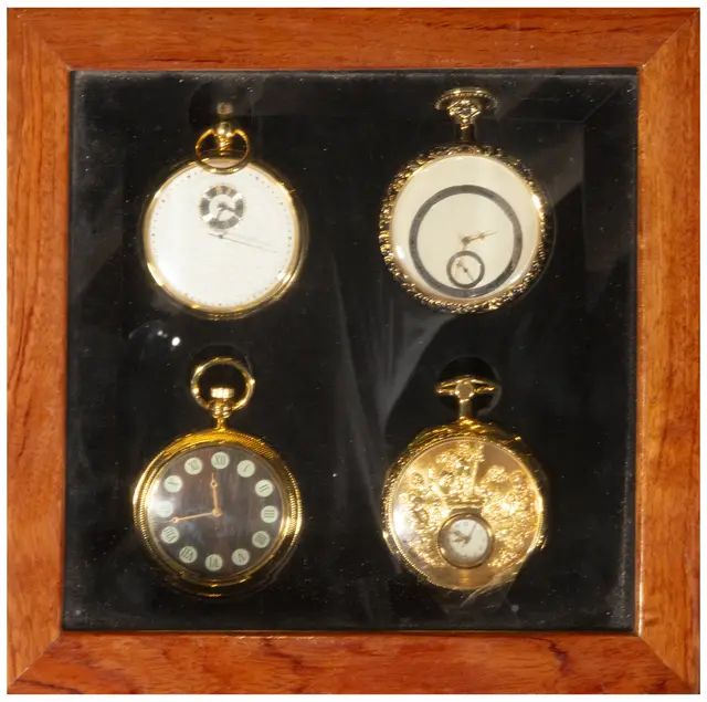 Set of four pocket watches with varied decoration