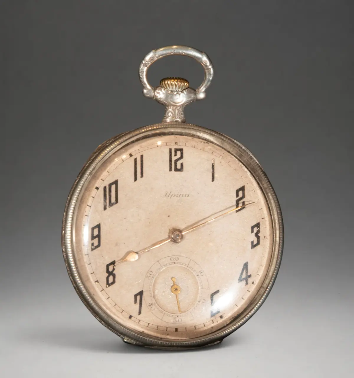 Pocket watch with stylized Arabic numerals