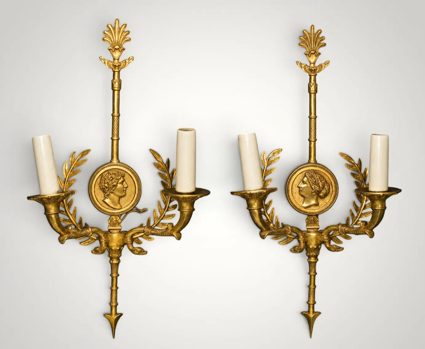 Elegant pair of Empire style Wall Light Appliques in gilt bronze, electrified