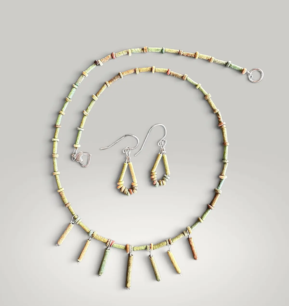 Set of necklace and earrings made of ancient Egyptian faience beads.