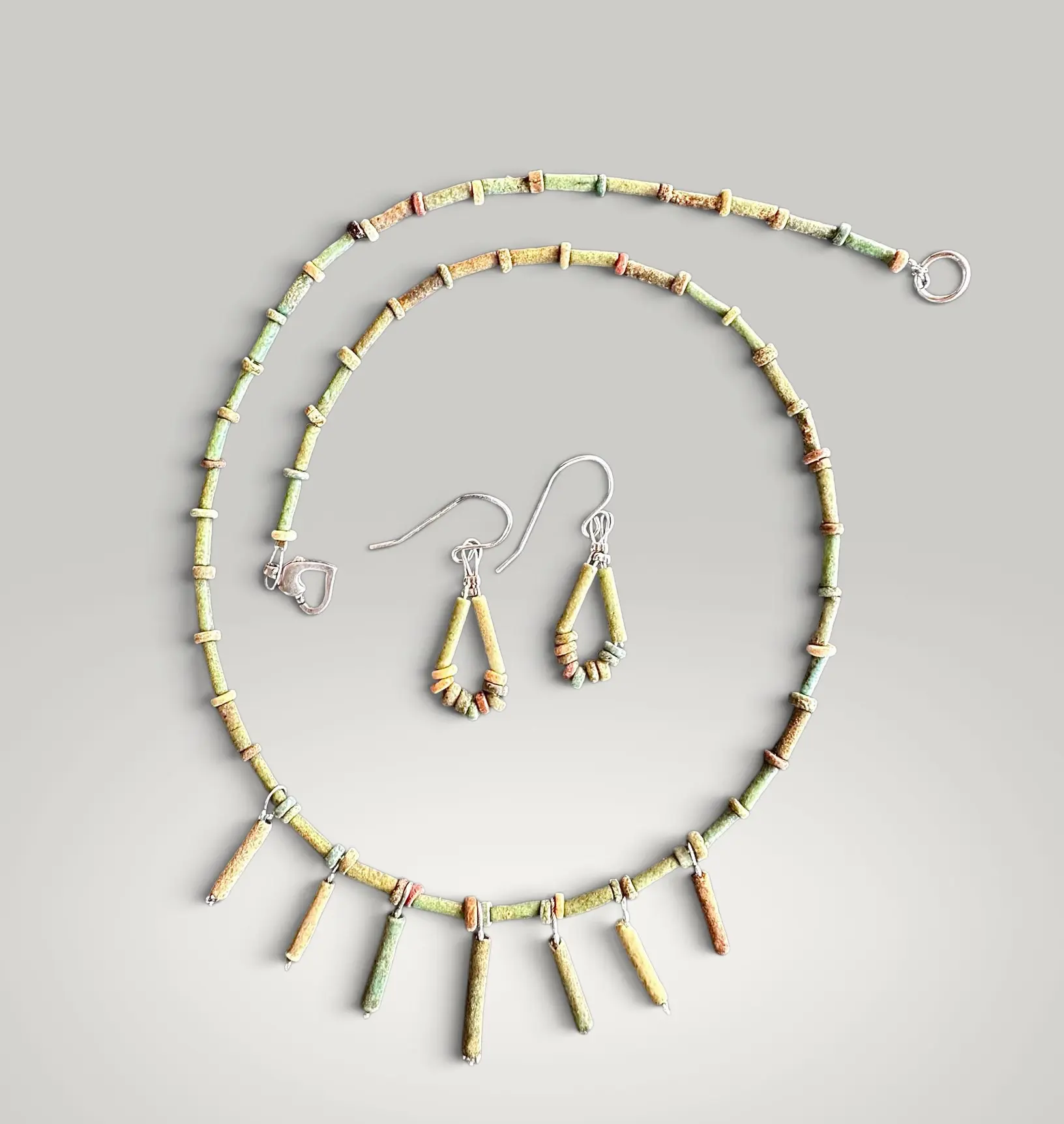 Set of necklace and earrings made of ancient Egyptian faience beads.