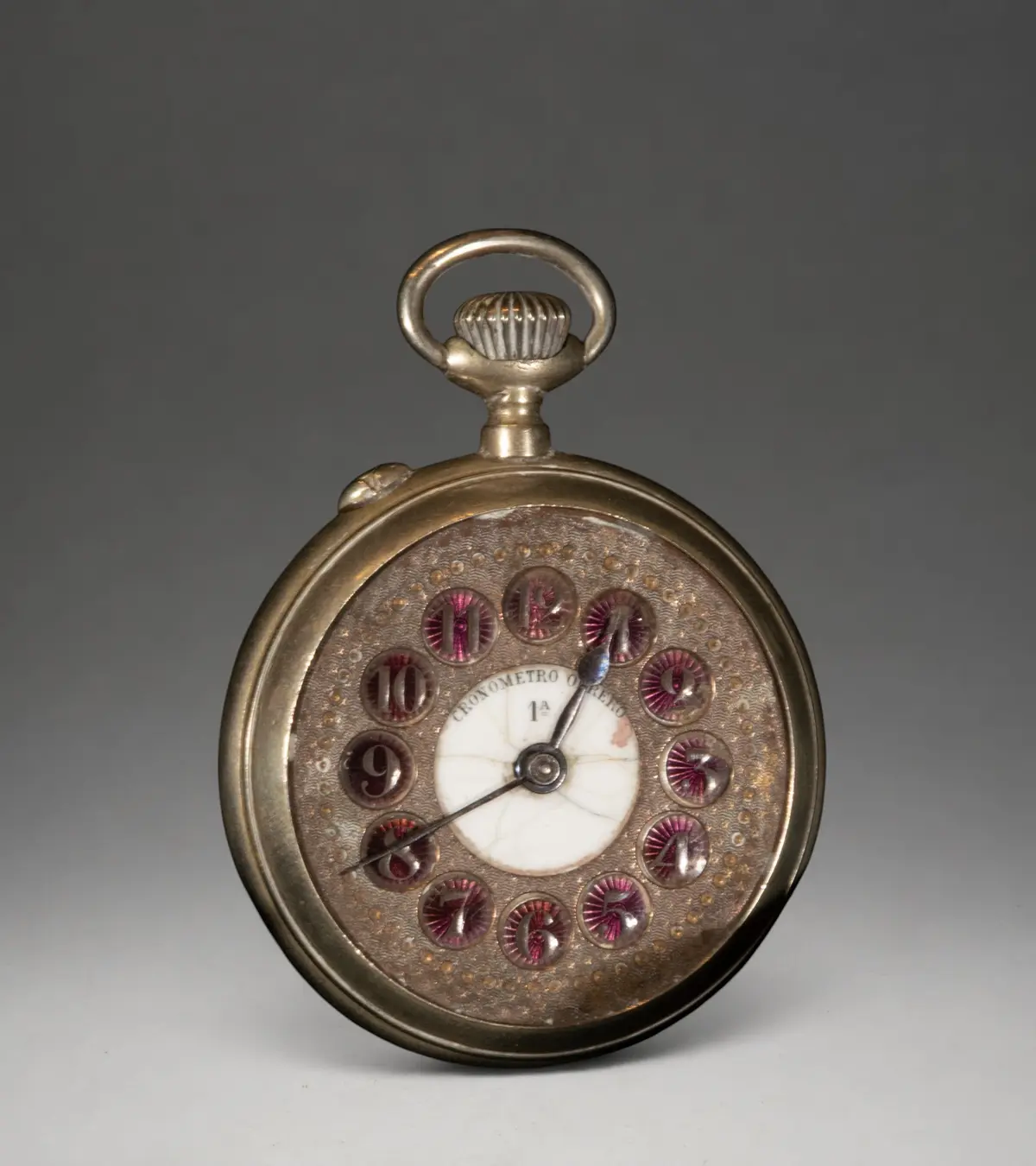 Pocket watch with ornamental dial and Arabic numerals