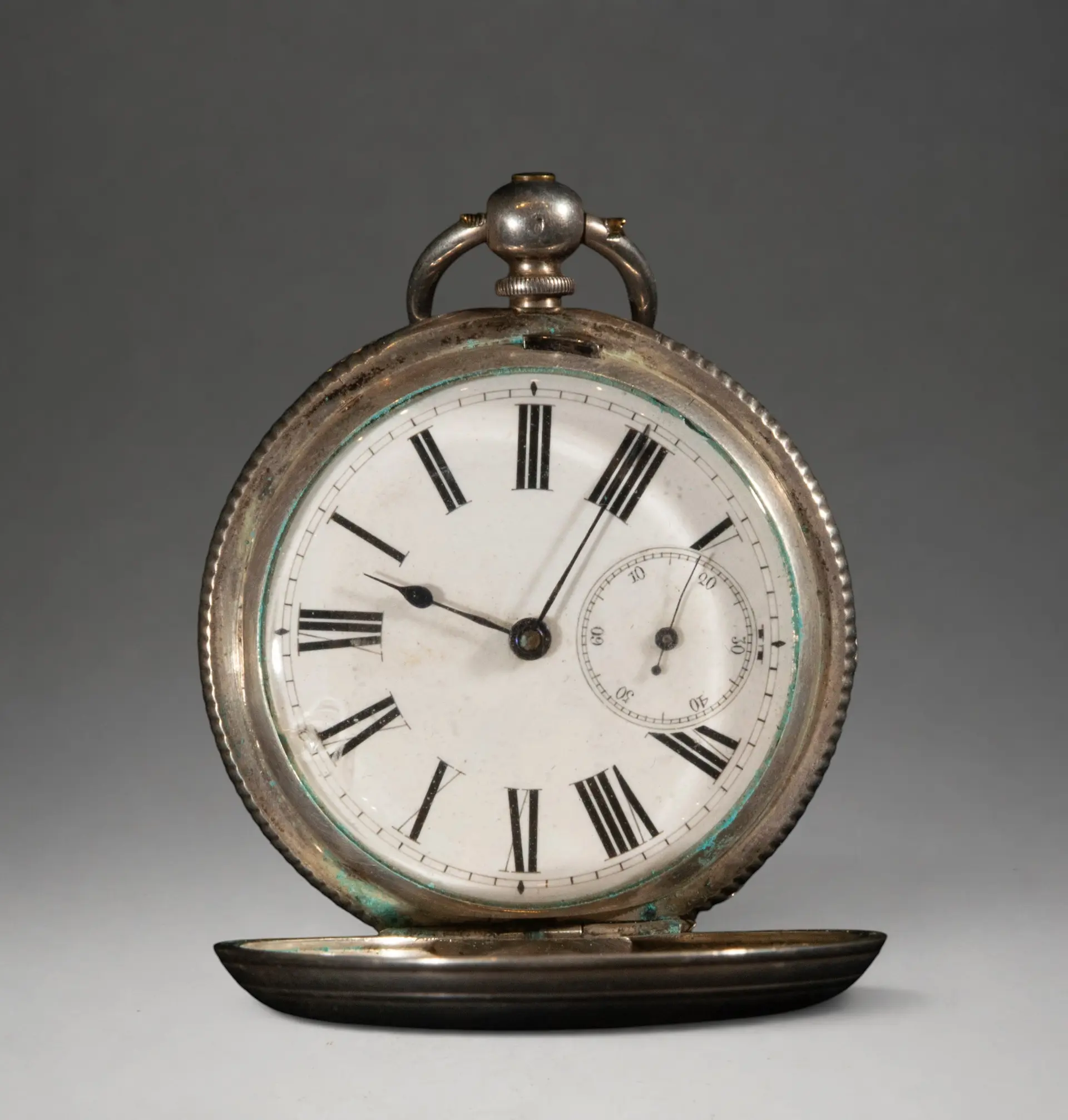 Pocket watch with hinged cover and Roman numeral dial