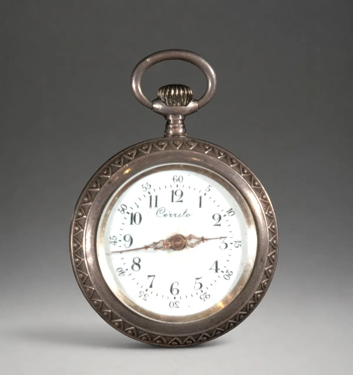 Miniature pocket watch with engraved case