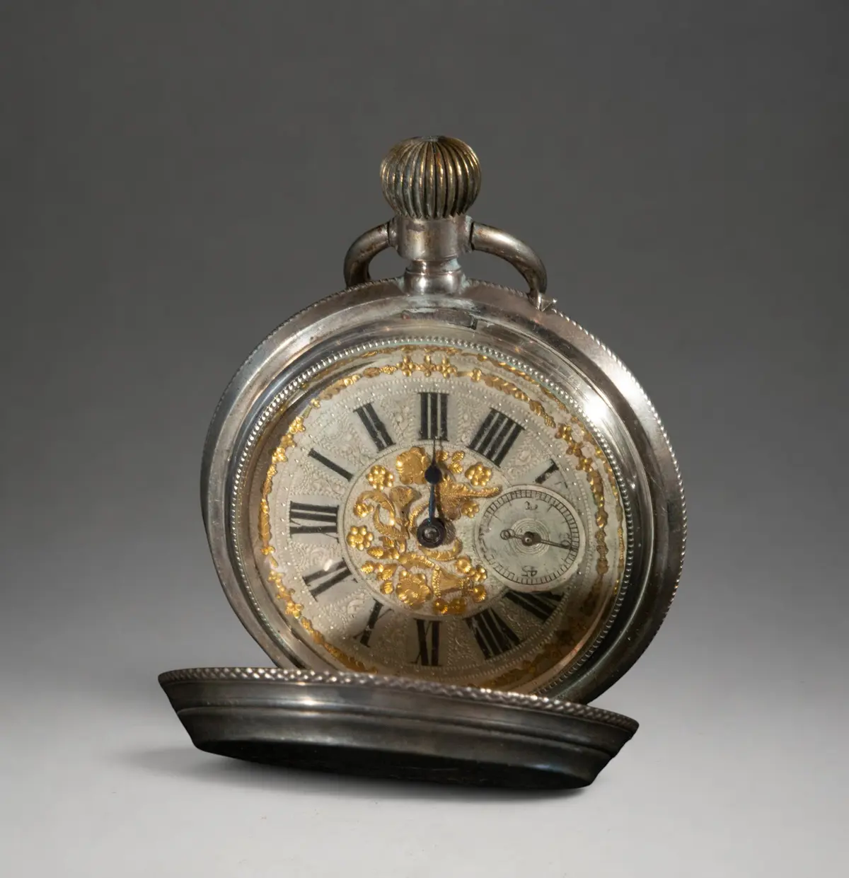 Pocket watch with visible mechanism