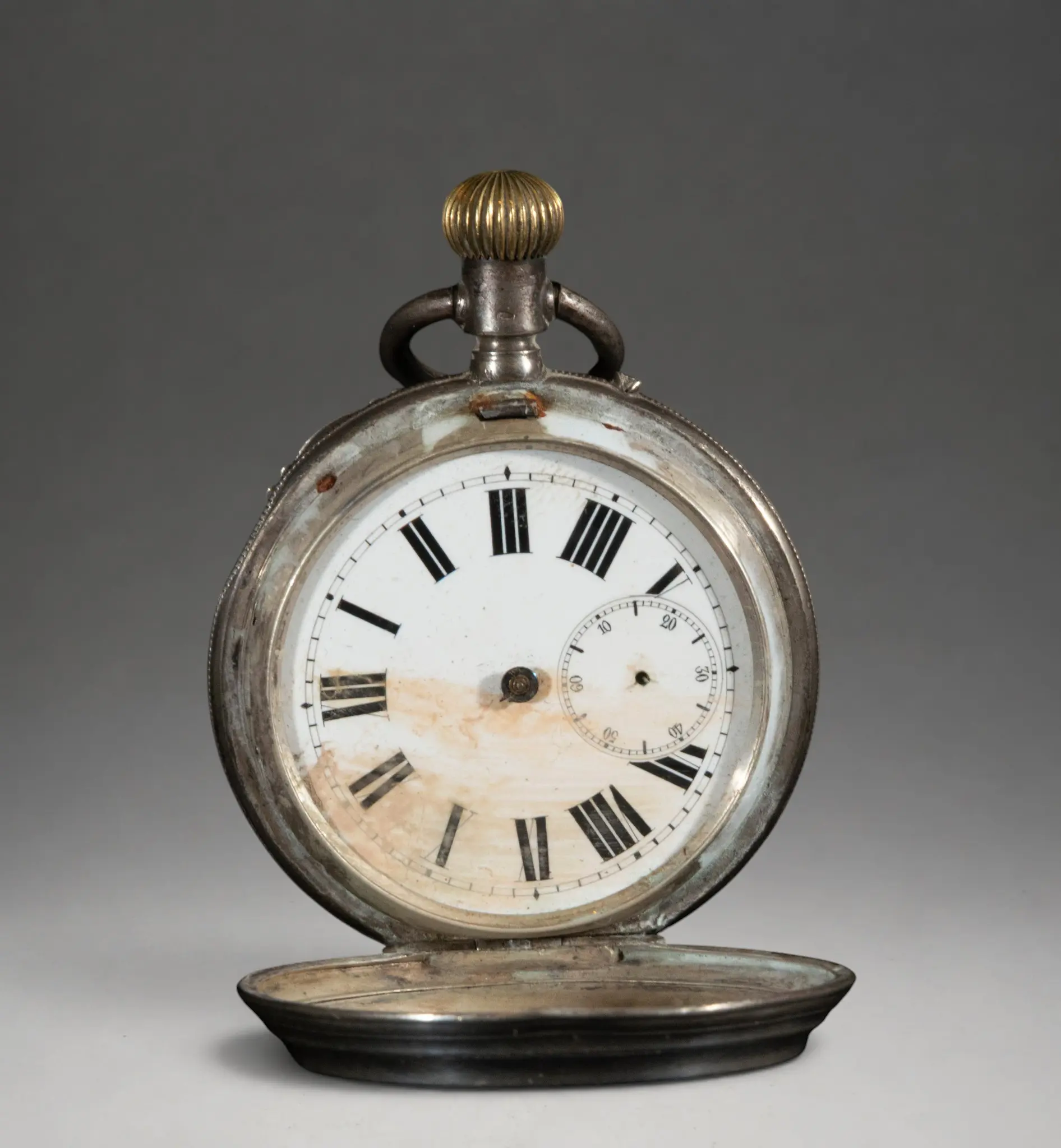 Pocket watch with hinged cover and Roman numeral dial