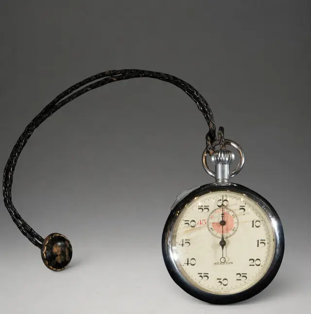 Pendant watch with black cord