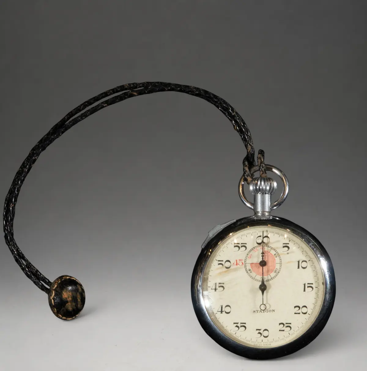 Pendant watch with black cord