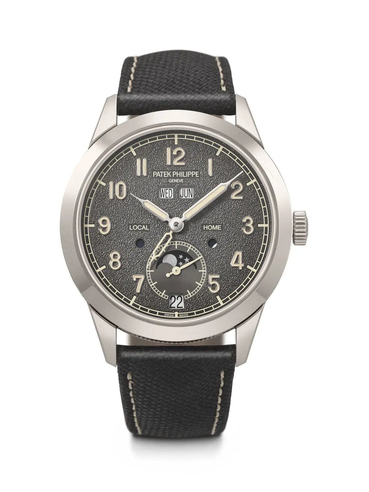 Patek Philippe. An Attractive 18K White Gold Automatic Annual Calendar