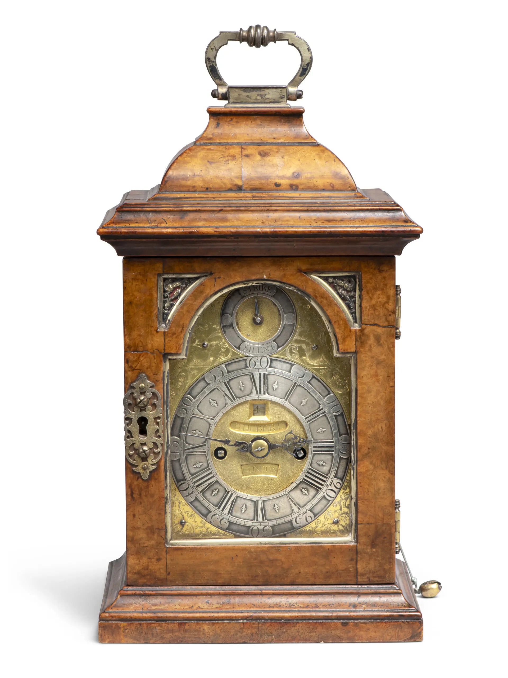 A George I Walnut and Silver-Gilt ‘Miniature’ Striking Table Clock