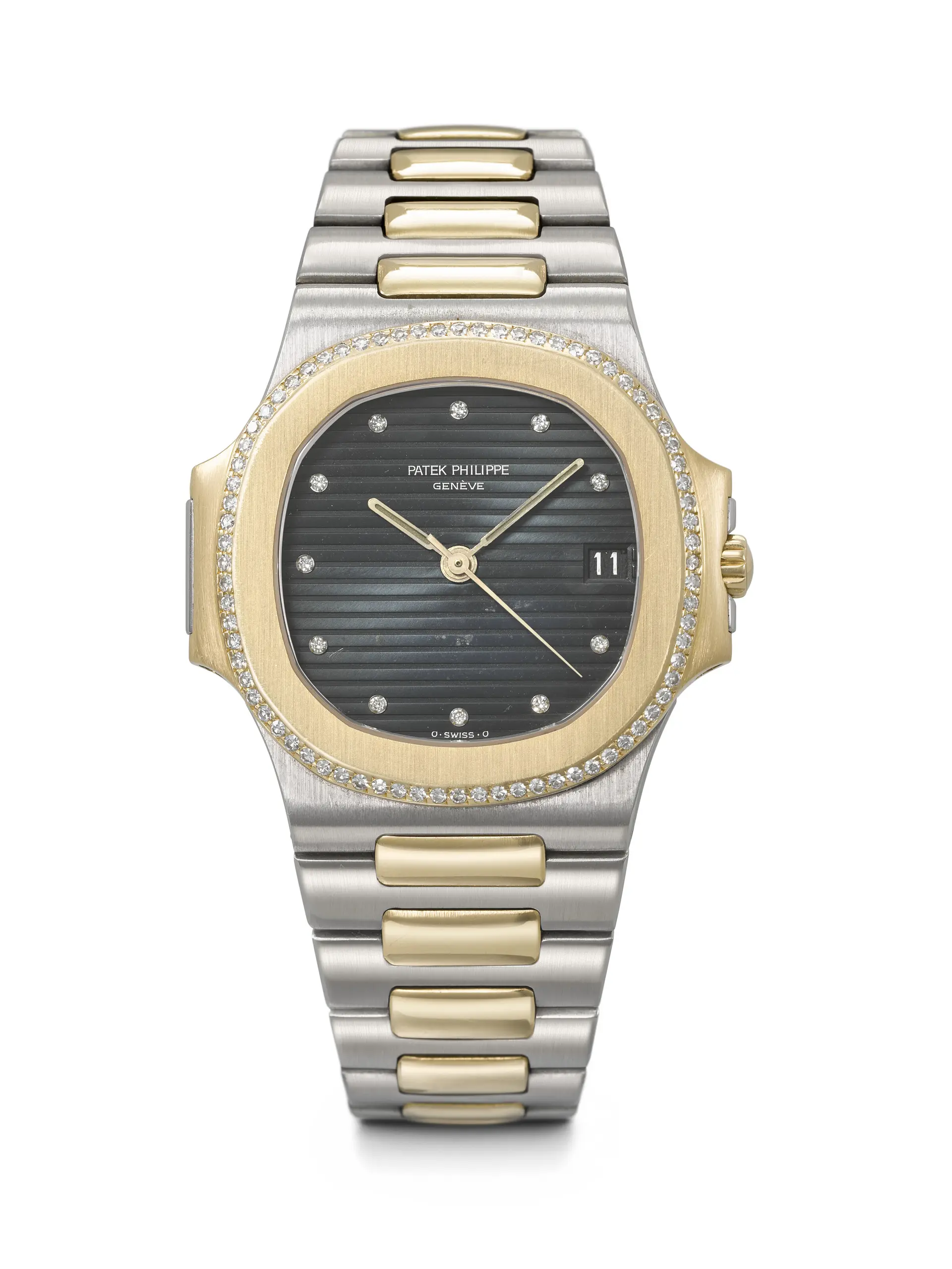 Patek Philippe. A Rare and Attractive 18K Gold, Stainless Steel and