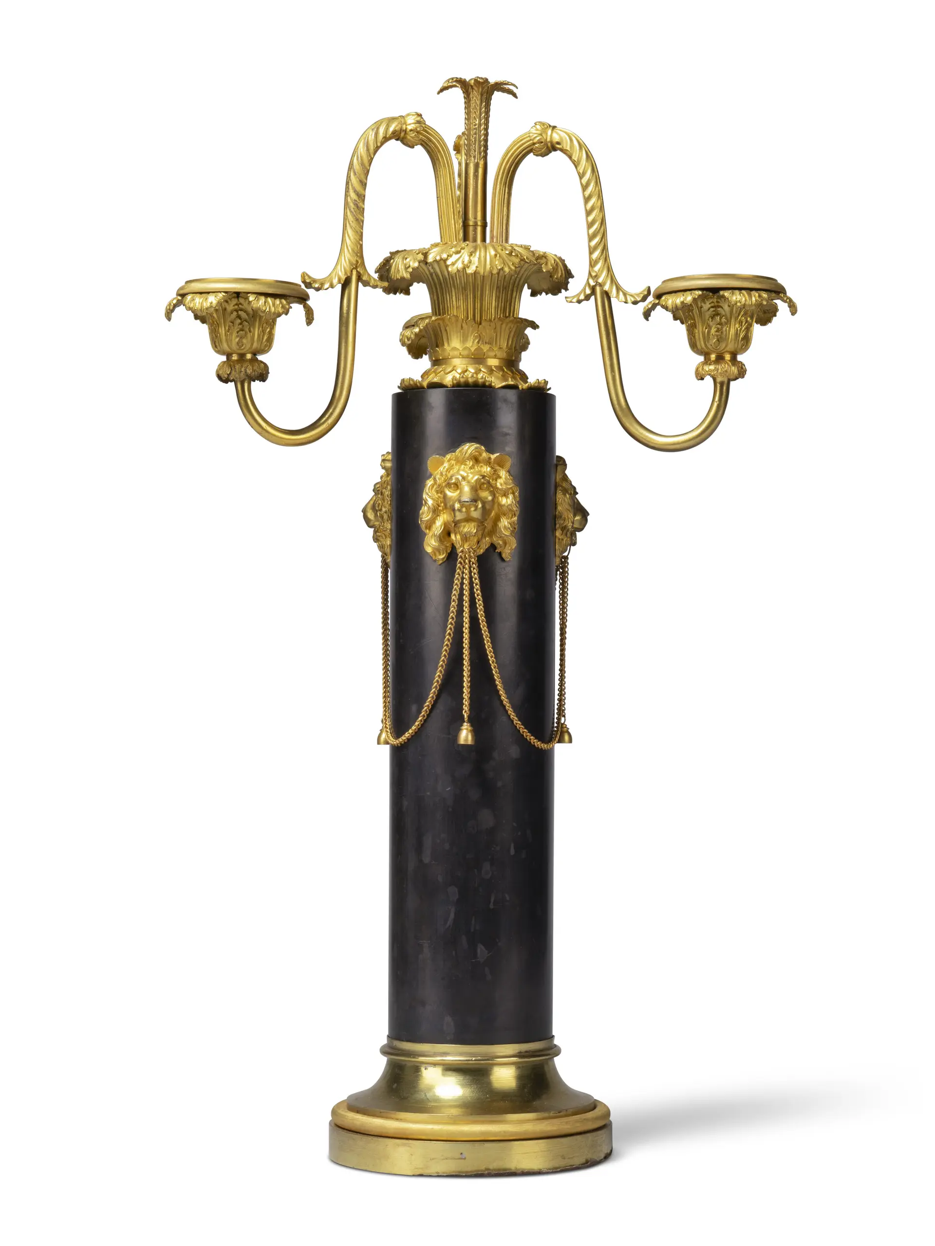 A Regency Brass and Black Slate Three-Light Candelabrum