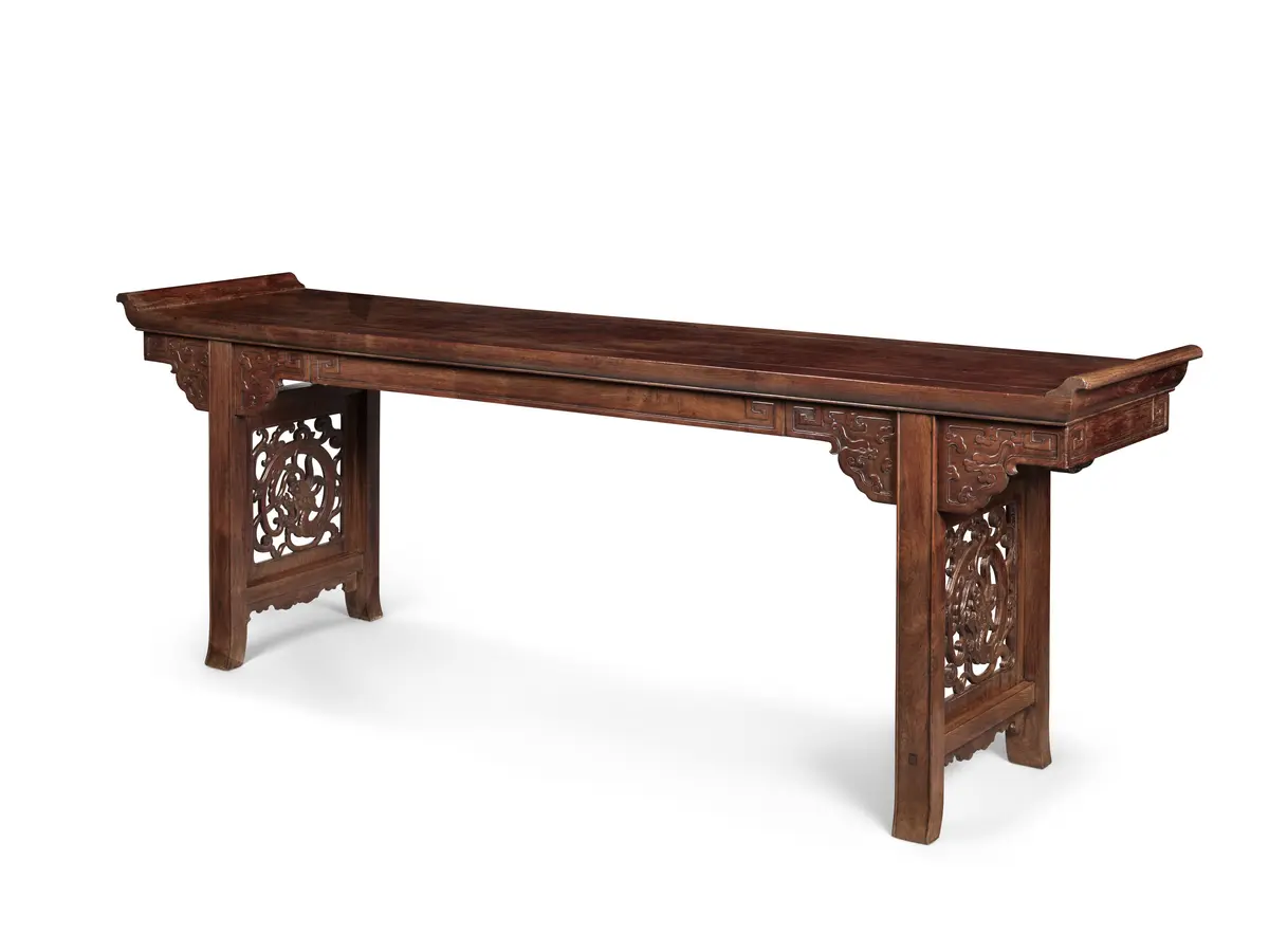An Impressive and Rare Huanghuali Trestle-Leg Table
