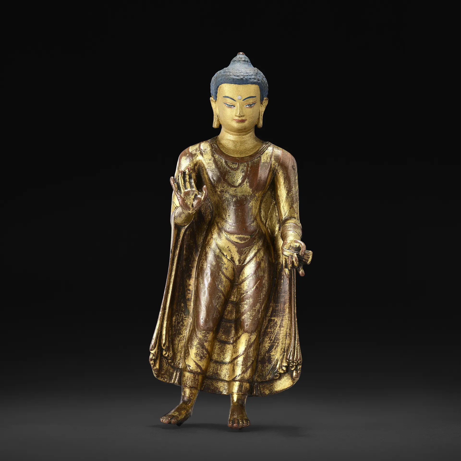 A Gilt Copper Alloy Figure of Shakyamui Buddha