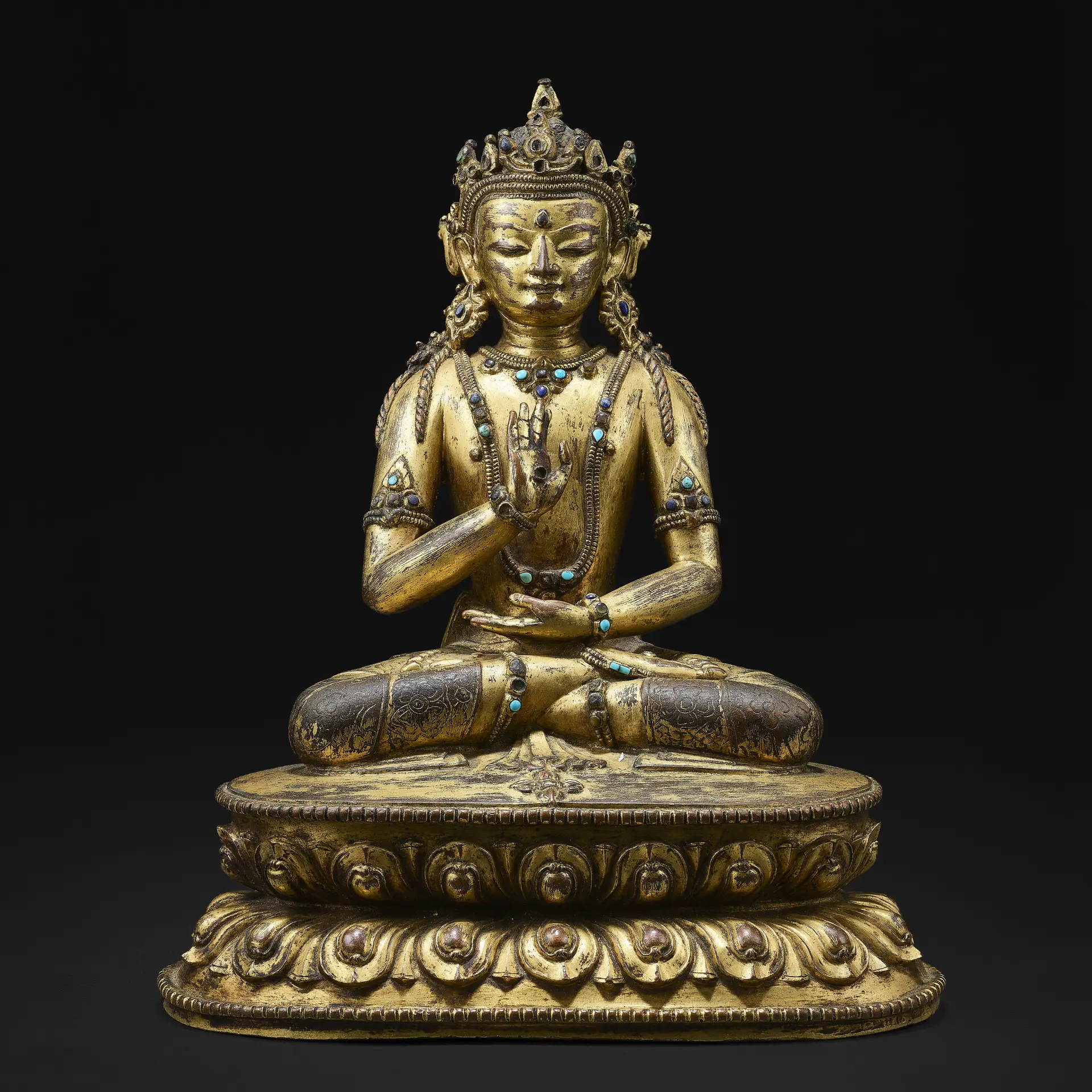 A Gilt Copper Alloy Figure of Amoghasiddhi