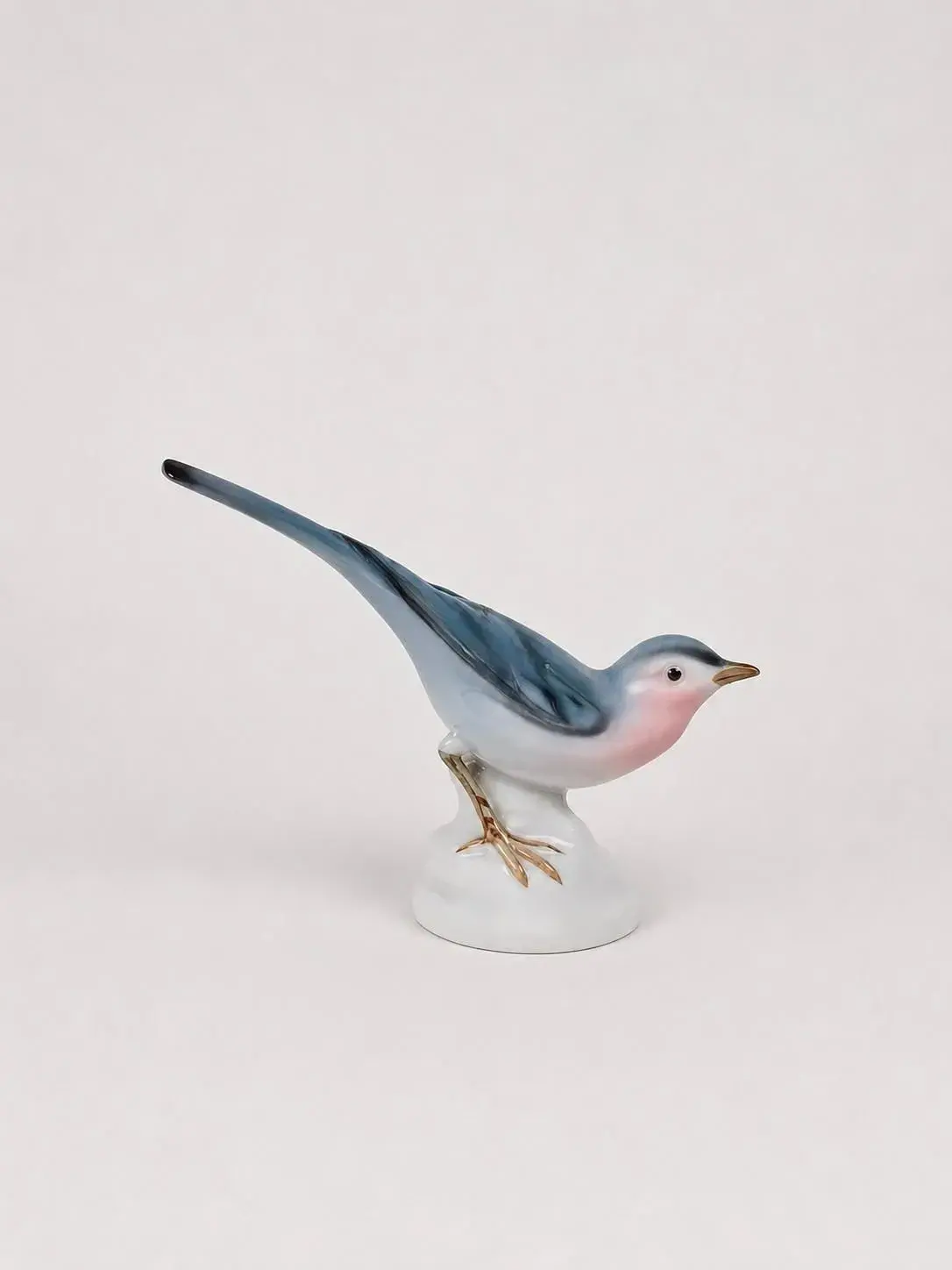 A German porcelain figurine with polychrome glaze depicting - Lot 81